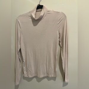 Elegant Cream Turtleneck Top